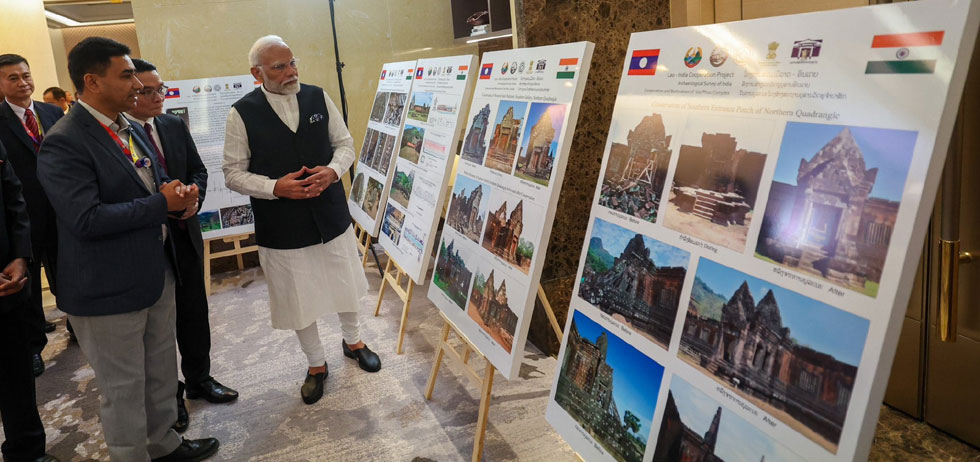 Prime Minister Shri Narenda Modi witnessed an exhibition on restoration work by ASI of UNESCO World heritage site of Vat Phou.